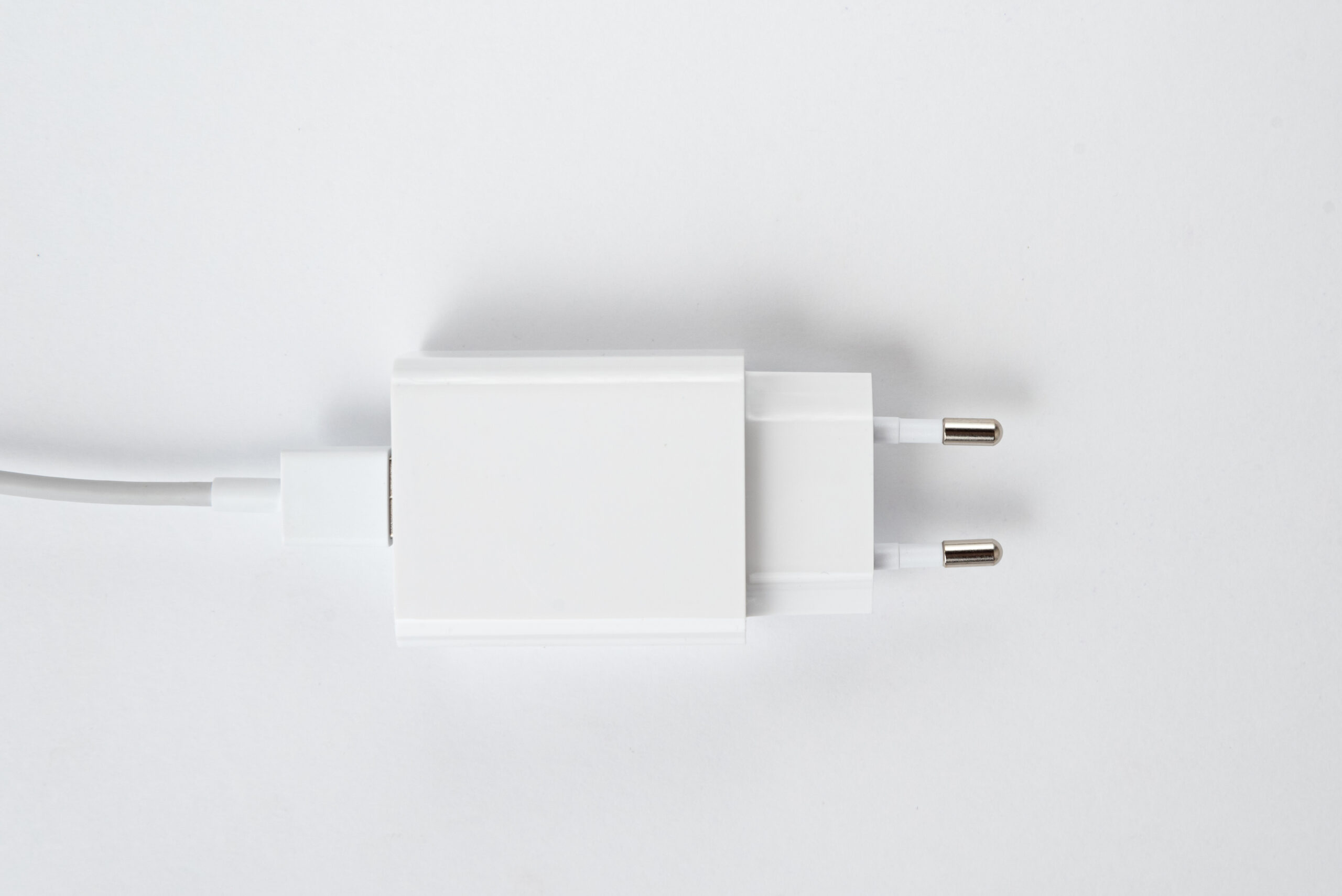 white-cell-phone-charger-white-isolated-background-with-usb-cabe-scaled.jpg