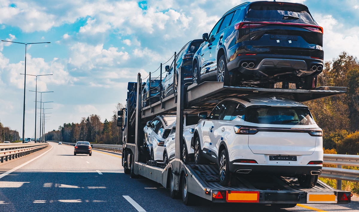 car-transport-truck-driving-on-highway-road-car-c-2024-09-23-16-39-30-utc.jpg
