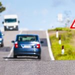 car-traveling-in-the-street-2023-11-27-05-22-12-utc-e1719309150538.jpg