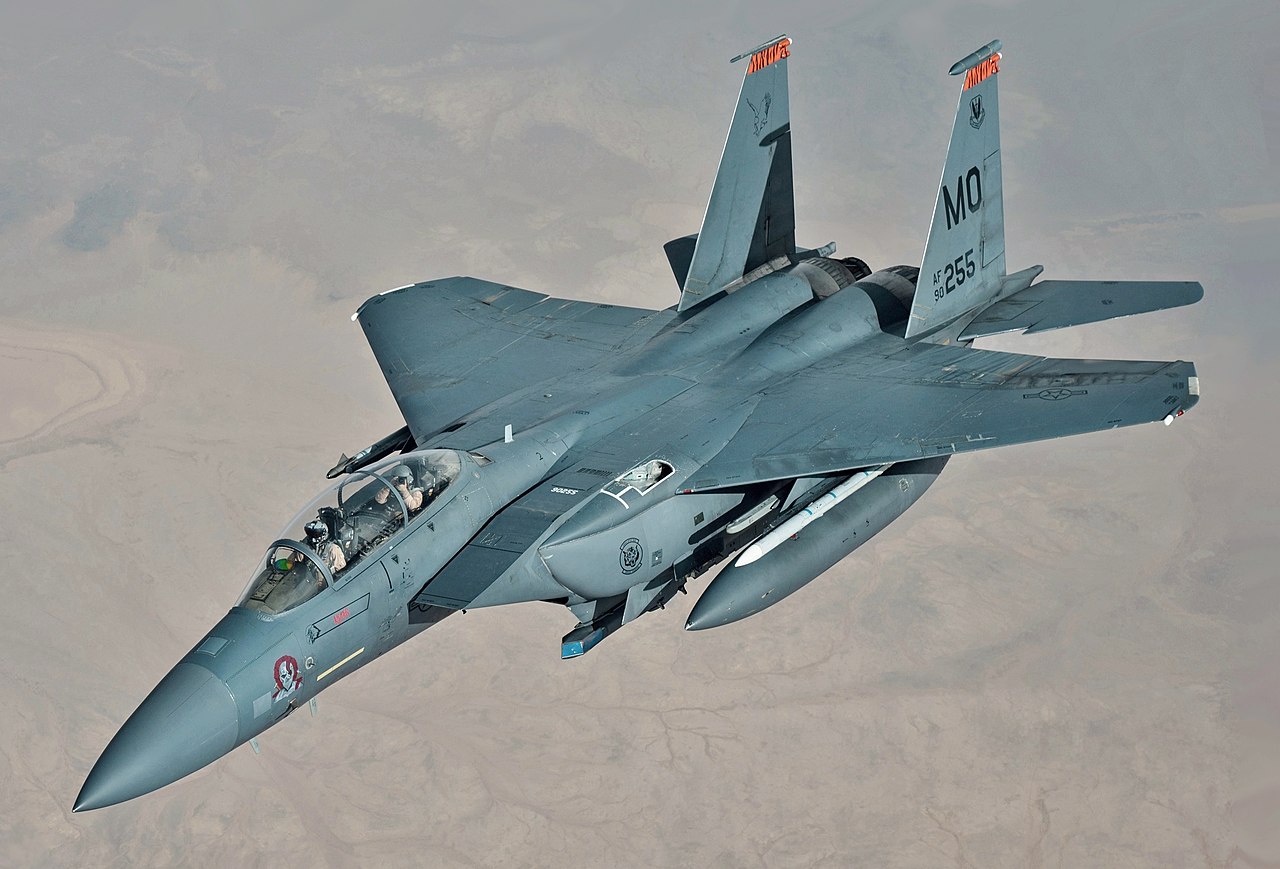 1280px-F-15E_takes_on_fuel_from_KC-10.jpg
