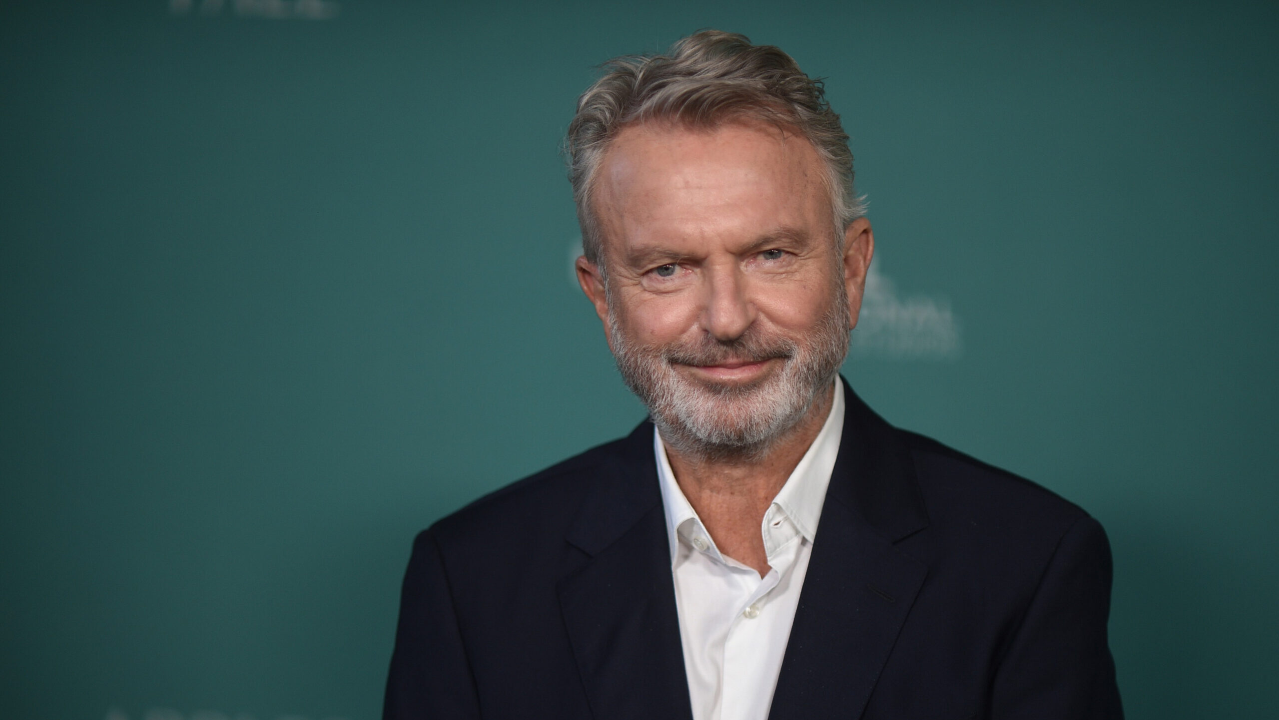 Sam-Neill-scaled-e1783924849995.jpg