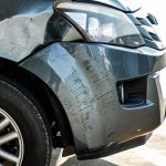 damaged-gray-car-in-parking-lot-2026-01-07-22-59-51-utc.jpg